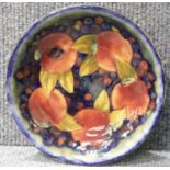 Moorcroft signed shallow bowl in the Blue Pomegranate pattern, D: 18 cm. P&P Group 1 (£14+VAT for