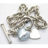 Ladies heavy round link T-bar bracelet and heart pendant. P&P Group 1 (£14+VAT for the first lot and