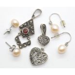 Two pairs of ladies stud earrings and two vintage marcasite pendants. P&P Group 1 (£14+VAT for the