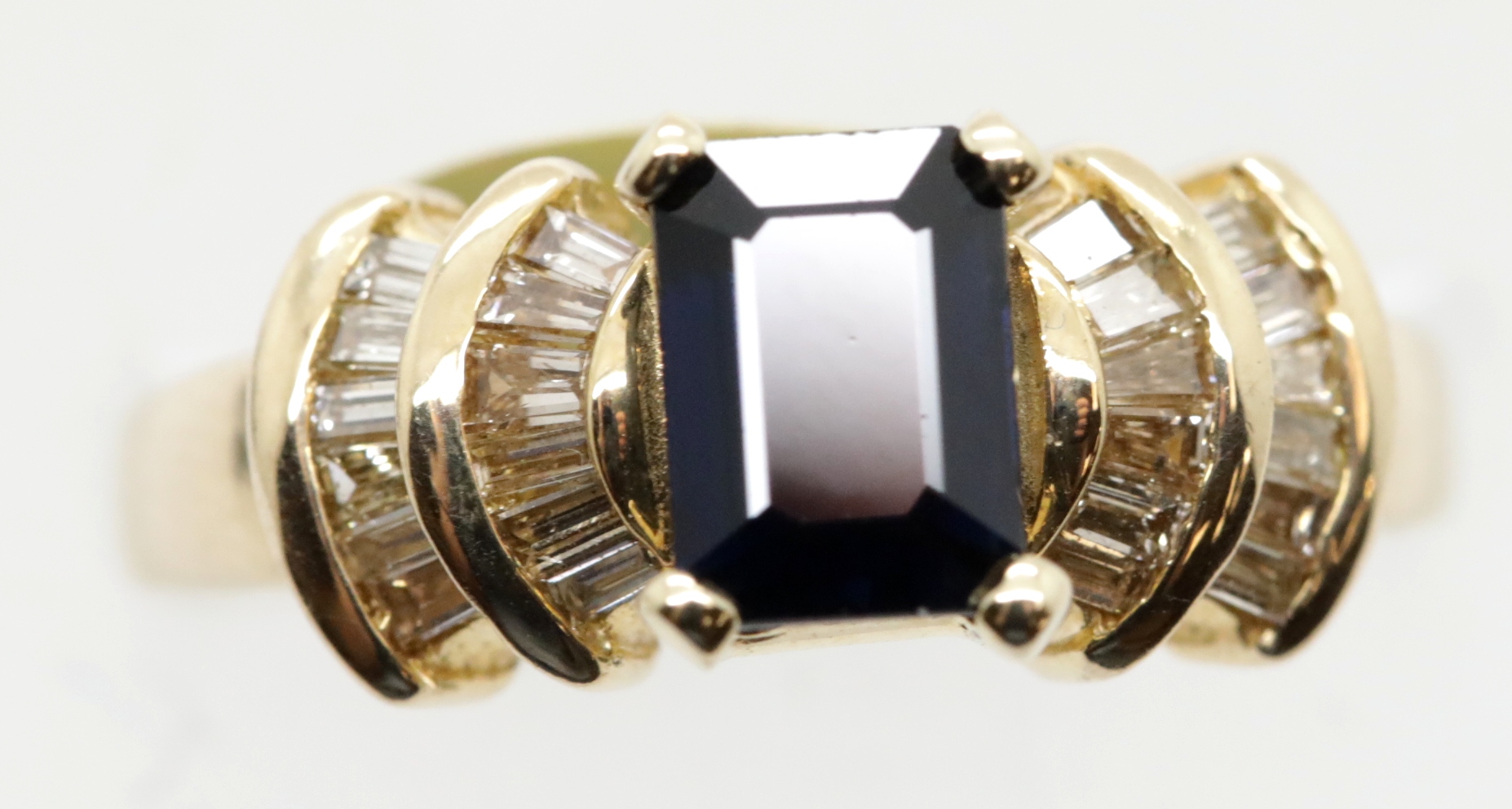 American 14ct gold, emerald cut sapphire and baguette cut diamond ring, size L, 4.2g. P&P Group