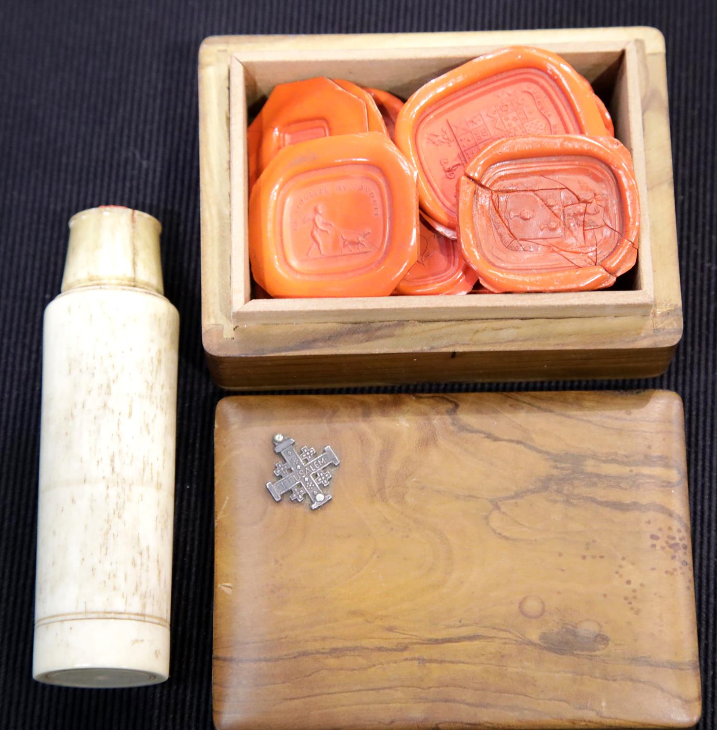 An olive wood Jerusalem box containing a quantity of wax seals and a bone screw top bottle. P&P