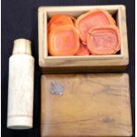 An olive wood Jerusalem box containing a quantity of wax seals and a bone screw top bottle. P&P