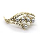 Pearl brooch in a Mikimoto box. P&P Group 1 (£14+VAT for the first lot and £1+VAT for subsequent