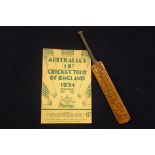 Miniature Nicholls cricket bat bearing the signatures of the 1956 Australian touring cricket team