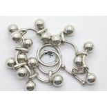 Ladies fancy unusual silver bracelet with T-bar clasp. P&P Group 1 (£14+VAT for the first lot and £