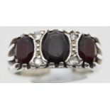 Silver vintage three stone garnet ring, size N. P&P Group 1 (£14+VAT for the first lot and £1+VAT