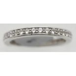 Ladies cubic zirconia full eternity ring, size P. P&P Group 1 (£14+VAT for the first lot and £1+