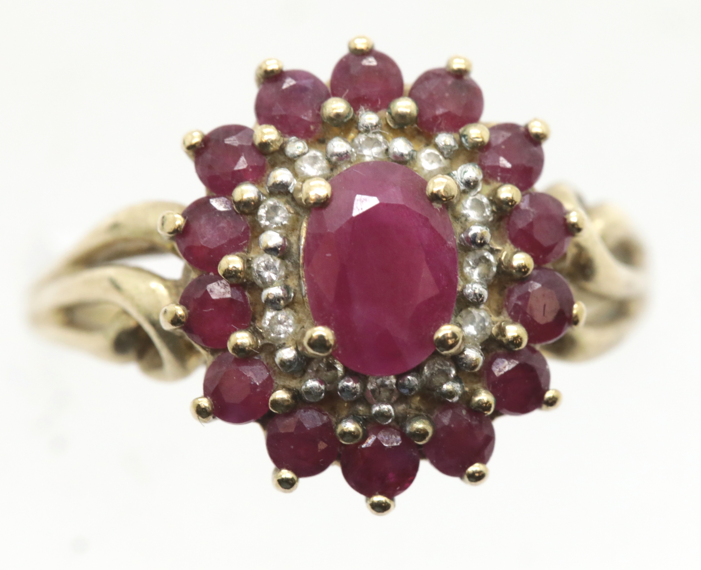 9ct gold, ruby and diamond cluster ring size R/S, 3.9g. P&P Group 1 (£14+VAT for the first lot