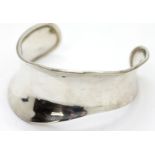 Vintage fancy slave bangle, W: 35 mm. P&P Group 1 (£14+VAT for the first lot and £1+VAT for