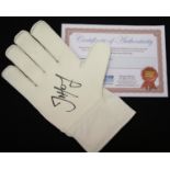 Joe Hart signed goalkeepers glove, with COA from Chaucer Auctions. P&P Group 2 (£18+VAT for the