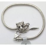 Ladies silver Amore and Baci bracelet with Leopard head chain. P&P Group 1 (£14+VAT for the first