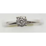 Ladies 9ct gold nine stone diamond ring, size R. 2.3g. P&P Group 1 (£14+VAT for the first lot and £