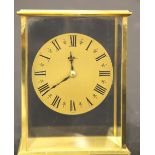 Brass Garrard quartz mantel clock, H: 12 cm. P&P Group 1 (£14+VAT for the first lot and £1+VAT for
