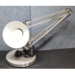 Silver coloured anglepoise lamp by Looitron. This lot is not available for in-house P&P, please