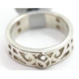 Silver solid ornate Celtic design band ring, size N. P&P Group 1 (£14+VAT for the first lot and £1+
