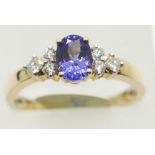 American 14ct gold, tanzanite and diamond ring, size T, 3.6g. P&P Group 1 (£14+VAT for the first lot