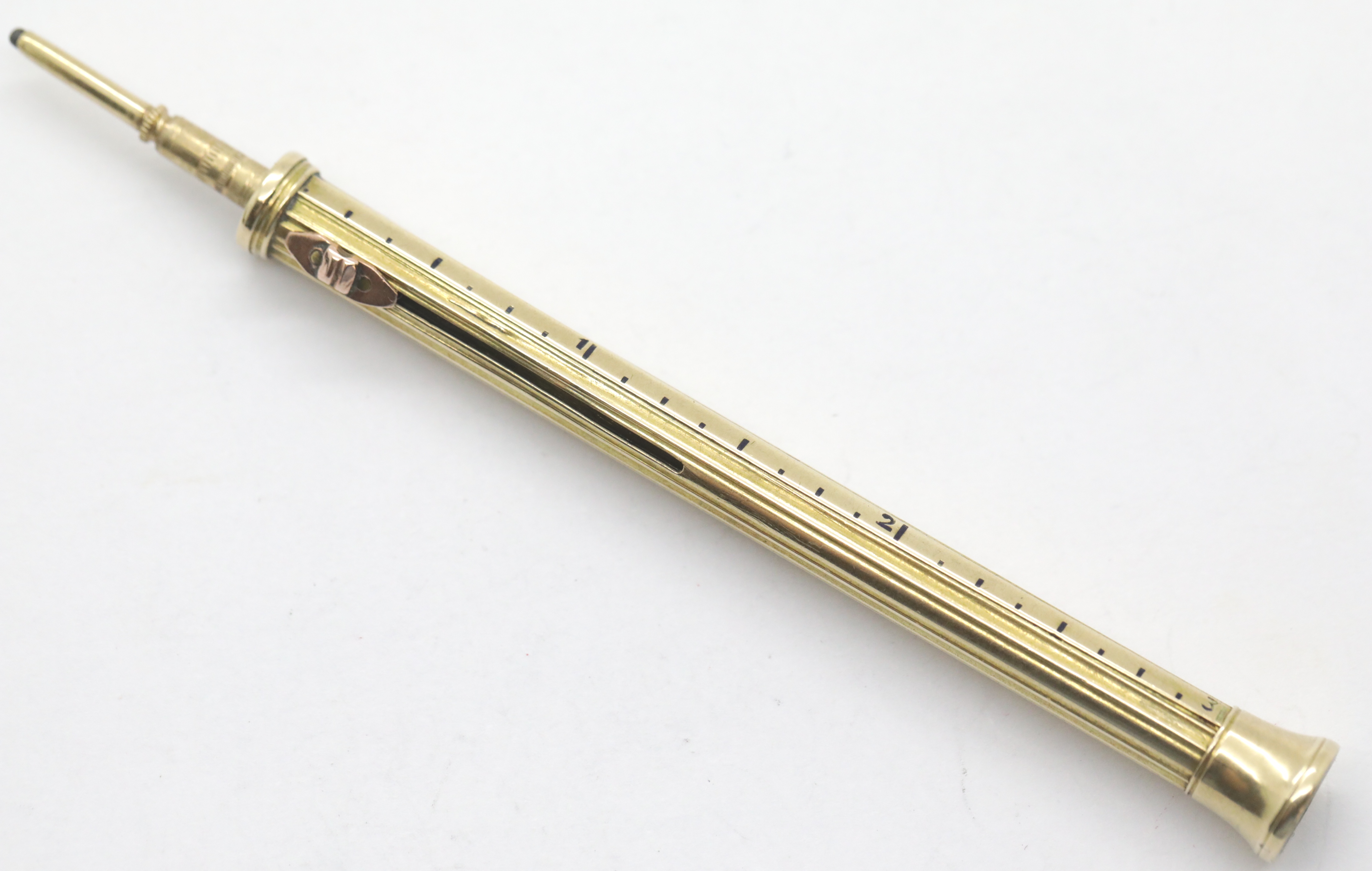 Presumed gold retractable pencil with bloodstane intaglio (Liver Bird?) seal and ruler markingsto