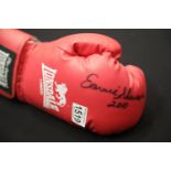 Earnie Shavers 2010 signed red Lonsdale boxing glove with no CoA. P&P Group 2 (£18+VAT for the first