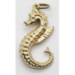 9ct gold seahorse charm. P&P Group 1 (£14+VAT for the first lot and £1+VAT for subsequent lots)