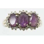 9 ct gold amethyst & diamond ring, size R/S, 3.1g. P&P Group 1 (£14+VAT for the first lot and £1+VAT