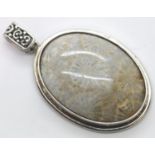 Large oval stone set pendant (presumed silver) 50 mm. P&P Group 1 (£14+VAT for the first lot and £