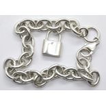 Silver heavy oval link bracelet with padlock charm, 24g. P&P Group 1 (£14+VAT for the first lot