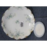 Limoges tazza in a floral pattern, D: 22 cm and a Lladro Great Crested grebe coaster. P&P Group