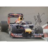 Sebastian Vettel signed British 2012 Grand Prix, 30 x 20 cm with COA from Tony Wilson Memorabilia.