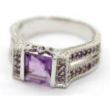 Silver princess cut amethyst ring with amethyst shoulders, size P, 5.4g. P&P Group 1 (£14+VAT for