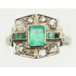 Unusual presumed platinum Art Deco style ring with green stones and mismatched diamonds. Total