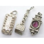 Three vintage solid silver assorted charms. P&P Group 1 (£14+VAT for the first lot and £1+VAT for