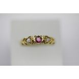 Antique 18ct ornate three stone ruby and diamond ring, size N, 2.6g. P&P Group 1 (£14+VAT for the