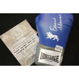 Earnie Shavers signed blue Lonsdale boxing glove with CoA from Montage Moments. P&P Group 2 (£18+VAT