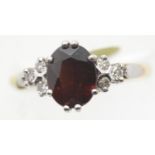 Ladies 18ct gold 1970s vintage garnet and diamond ring, size O, 4.0g. P&P Group 1 (£14+VAT for the