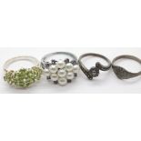 Four mixed silver rings, modern and vintage. P&P Group 1 (£14+VAT for the first lot and £1+VAT for