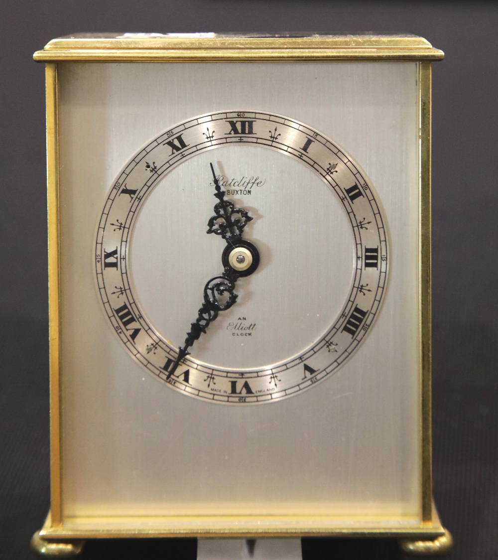 Heavy brass Elliott mechanical mantle clock retailed by Ratcliffe of Buxton, H: 14 cm. P&P Group