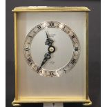 Heavy brass Elliott mechanical mantle clock retailed by Ratcliffe of Buxton, H: 14 cm. P&P Group