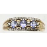 9ct gold ring set with tanzanite coloured stones, size P, 2.4g. P&P Group 1 (£14+VAT for the first