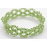 Boxed Shipton & Co peridot? bead elasticated bracelet. P&P Group 1 (£14+VAT for the first lot and £