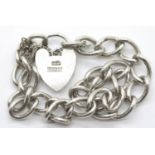 Ladies charm bracelet and padlock and safety chain. P&P Group 1 (£14+VAT for the first lot and £1+