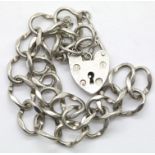 Vintage solid silver charm bracelet with padlock and safety chain. P&P Group 1 (£14+VAT for the