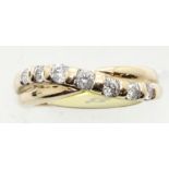 Ladies 9ct gold fancy 1970s diamond crossover ring, size K, 2.9g. P&P Group 1 (£14+VAT for the first