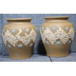 Pair of Doulton Lambeth Silicon Pink vases, no. D8419, one stamped HH, H: 13 cm. P&P Group 3 (£25+