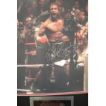 Nigel Benn signed framed photograph with CoA from Legends of Sport, frame size, 73 x 62cm. P&P Group