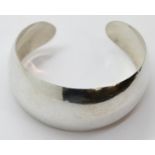 Silver 30 mm wide tapered fancy bangle. P&P Group 1 (£14+VAT for the first lot and £1+VAT for