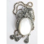 Vintage mother of pearl and marcasite pendant on 16" coriana chain. P&P Group 1 (£14+VAT for the