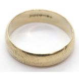 Broad 9ct gold wedding band, size T, 3.7g. P&P Group 1 (£14+VAT for the first lot and £1+VAT for