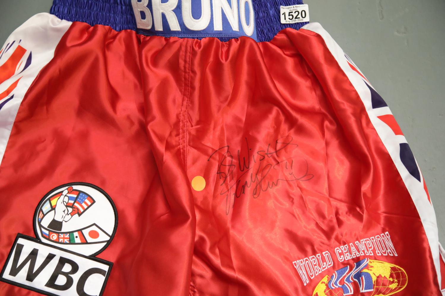 Frank Bruno signed red boxing shorts with no CoA. P&P Group 2 (£18+VAT for the first lot and £2+