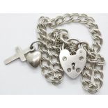 Silver 1970s double link charm bracelet with safety chain and padlock. P&P Group 1 (£14+VAT for