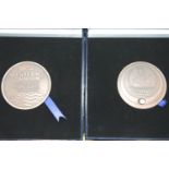 Two cased limited edition Western Union bronze table medals. P&P Group 1 (£14+VAT for the first
